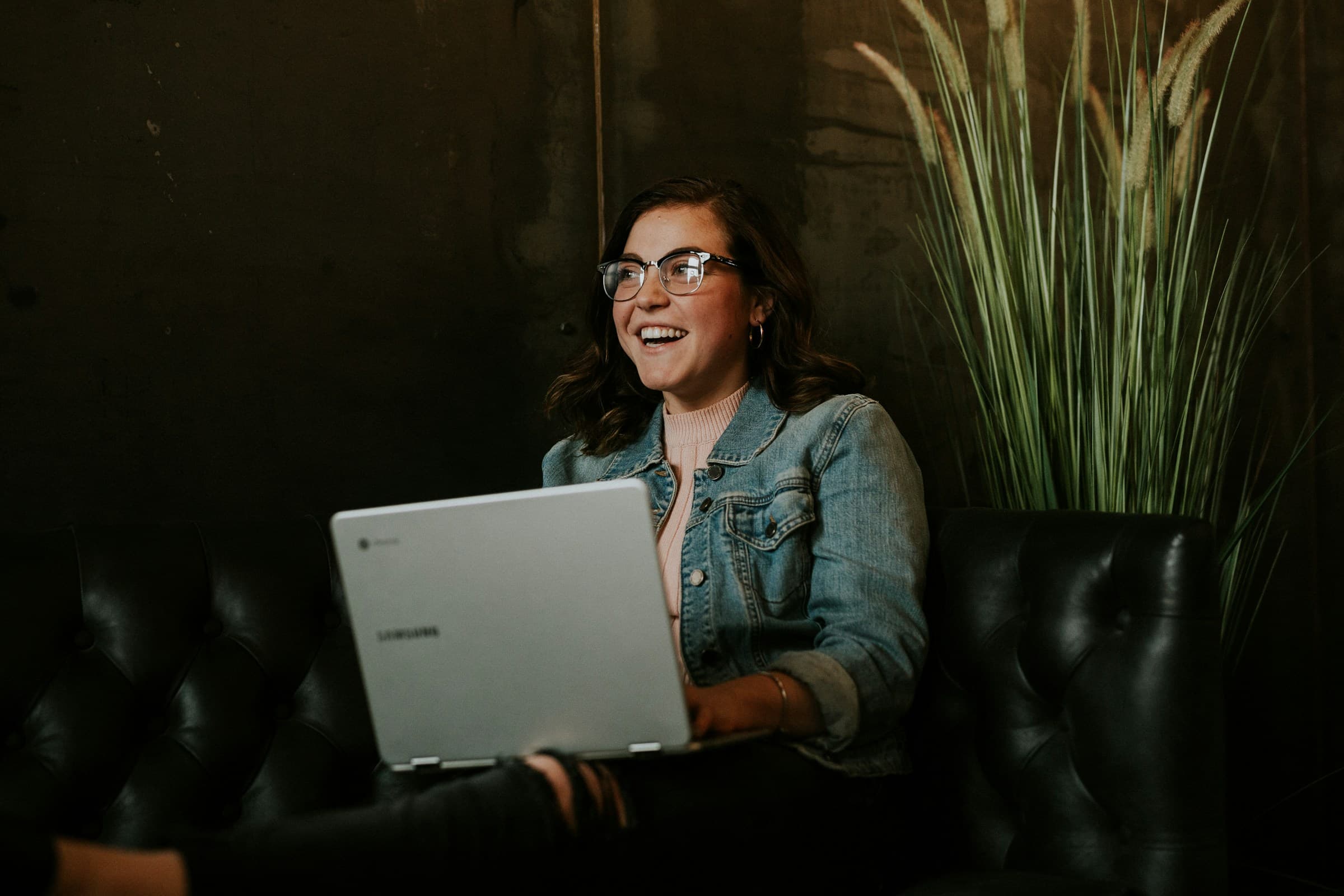 Publisher working on a laptop, monetizing with PubThrive